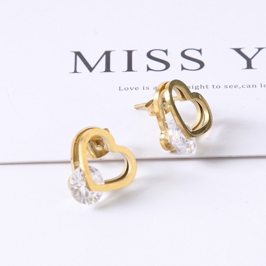 Aretes dorados de corazon con cristal