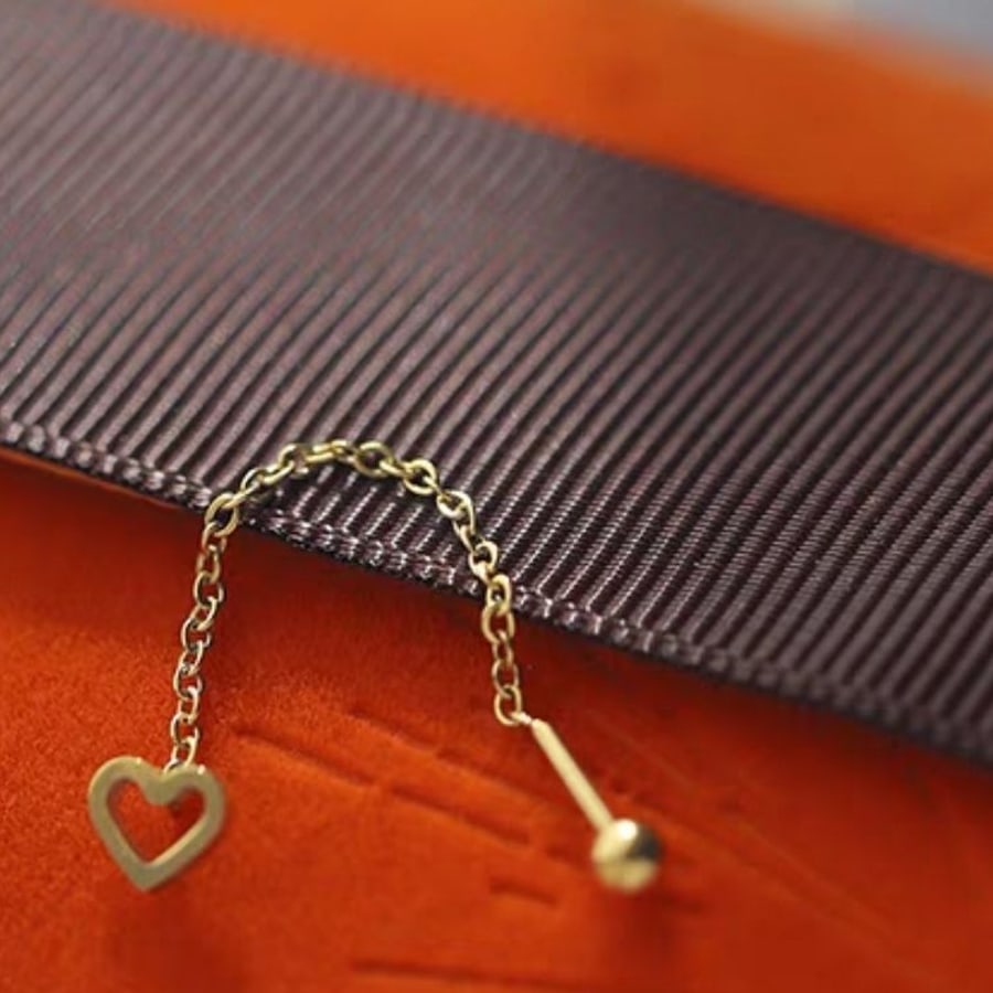 Arete colgante dorado con corazon